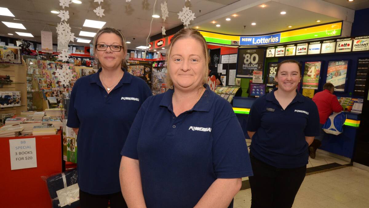 MENTAL HEALTH: Nextra Newsagency staff member Susie Richardson, owner Tracey Pluis, staff member Caitlin White raised $1,100 for Beyond Blue. PHOTO: JUDE KEOGH