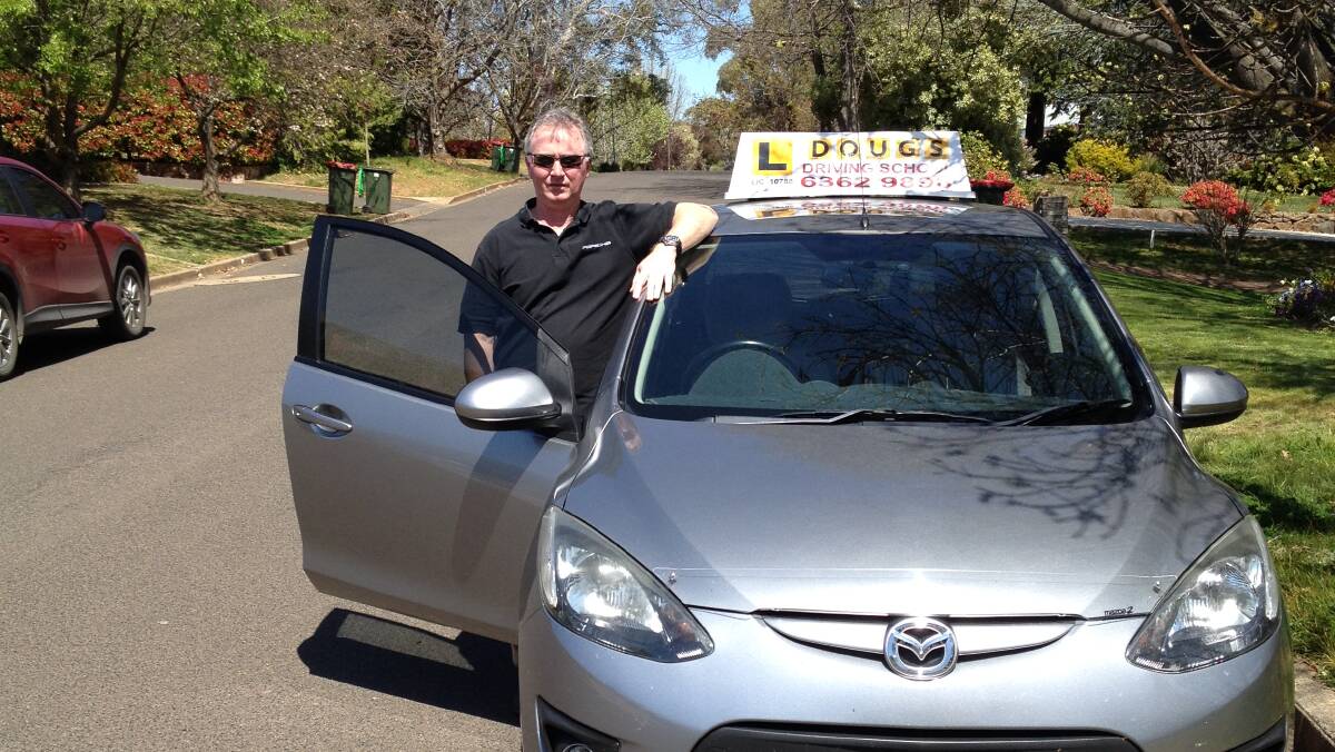 LESSONS IN LOCKDOWN: Doug's Driving School instructor Dave Toomey cancels lessons amid the risk of spreading the coronavirus. Photo: SUPPLIED. 