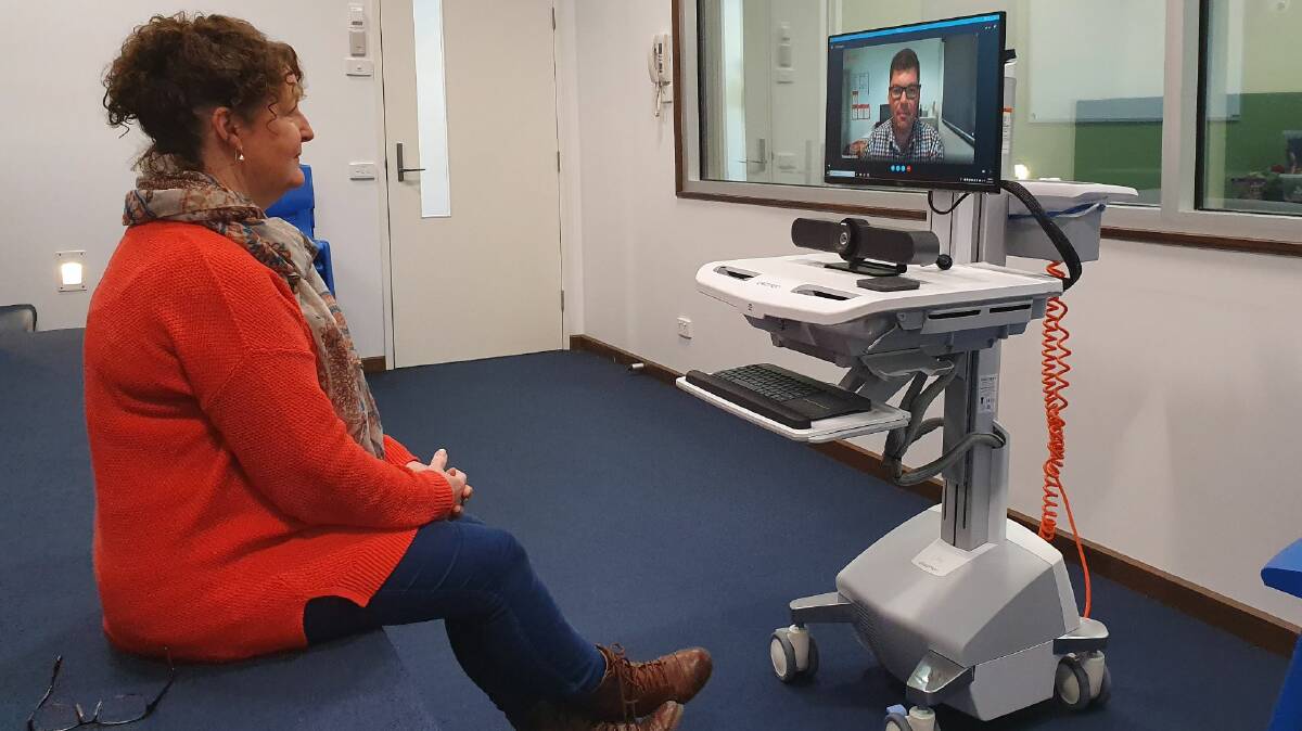 FREE COURSE: Three Rivers University Department of Rural Health Lecturer Brent Smith and Placement Officer Judy Mason use telehealth technology. Photo: SUPPLIED.
