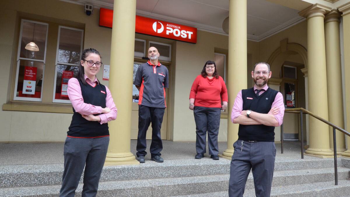 ONLINE ORDERS: Orange Post Office acting manager Emma Kelly and staff members Kirby Pereira, Alison Strudwick and Mathew Paton. Photo: JUDE KEOGH