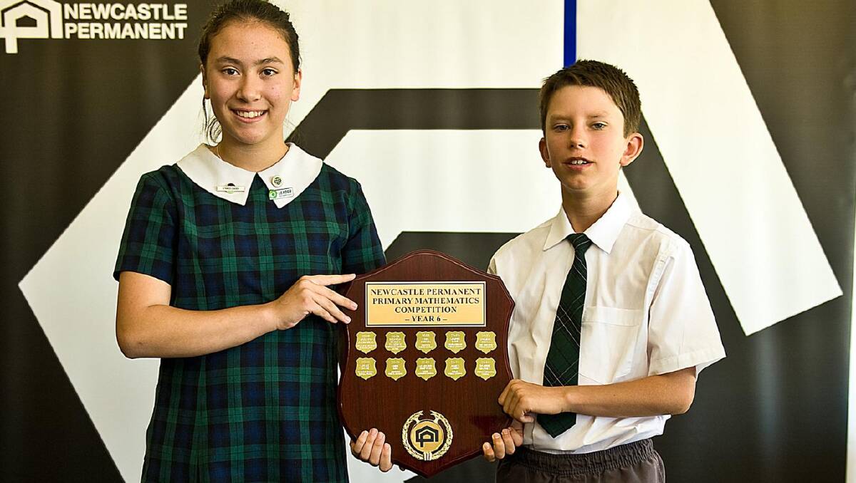 MATHS EXAM: Newcastle Permanent Primary Schools Mathematics competition 2019 winners Kinross Wolaroi School student Bonnie McPhee and Cudal Public School student James Lawry. Photo: SUPPLIED 