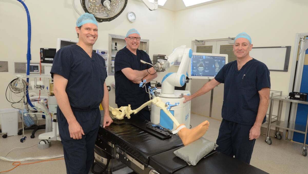 Dudley Private Hospital orthopaedic surgeon Dr Ben Milne, CEO Paul McKenna and orthopaedic surgeon Dr Evan Jones. Photo: JUDE KEOGH 