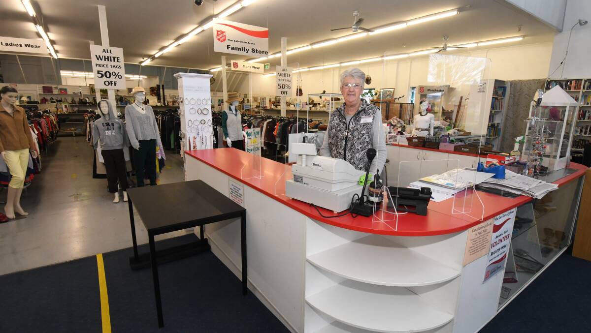 REOPENING: Salvation Army volunteer Jenny Agland ready to reopen the store to the public. Photo: JUDE KEOGH