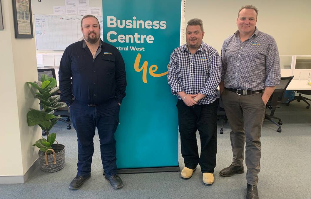COURSE WORK: TAFE NSW graduate students Clint Grevink and Matt Bryant and Optus Business Centre director Adam Sawtell. Photo: SUPPLIED