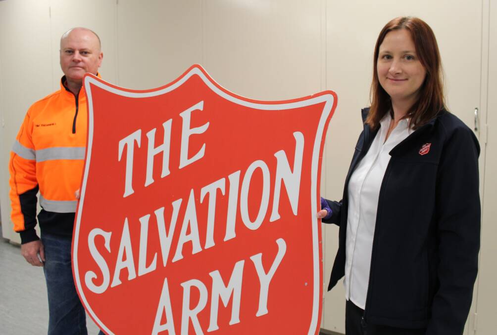 DONATION: Cadia Valley Operations' Tim Thornhill and Salvation Army Orange and Bathurst Corps Officer Kate Cathcart. Photo: ERIKA VASS