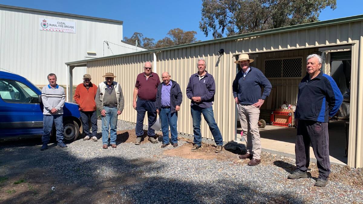 BLOCK UPGRADE: Cudal and District Men's Shed members Peter Gheorghe, George Johannson, Dave Farrell, Darcy Callan, Robert Smith, Phil Jeffery, Federal member for Calare Andrew Gee, men's shed member Peter Gwynne. Photo: SUPPLIED