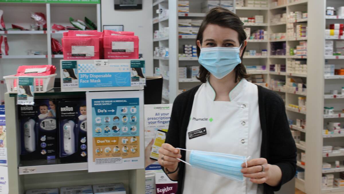 PRODUCT DEMAND: McCarthy's Pharmacy pharmacist Annika Rookyard urges people to wear face masks properly. Photo: ERIKA VASS
