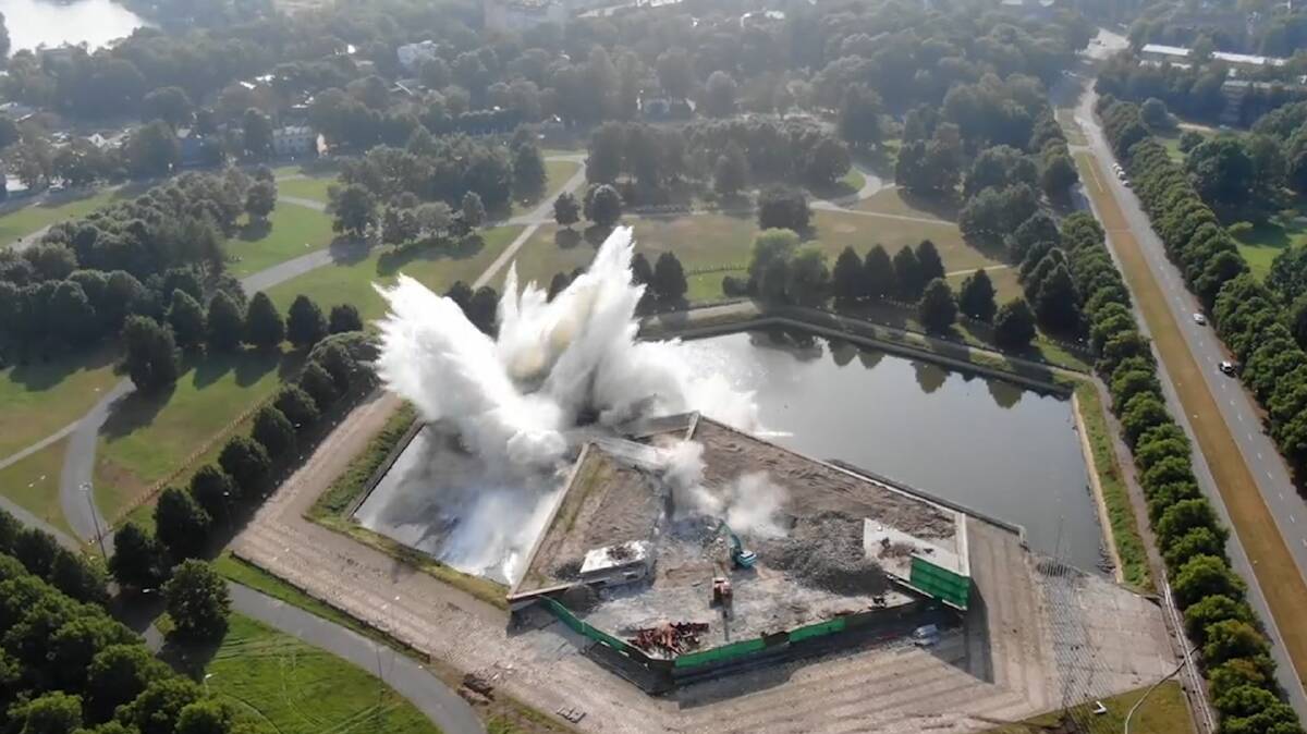 The Soviet-era monument topples into a pond inside Victory Park, Riga, Latvia. Picture supplied