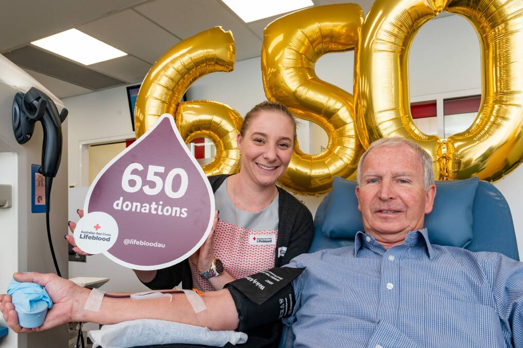 HERO: Launceston Blood Donor Centre session leader Abbey Waller with Graeme Goddard, who made his 650th donation on Friday. Photo: Phillip Biggs
