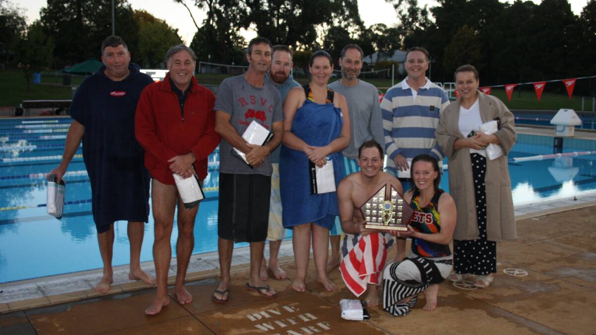 GRINNERS: Jets were all smiles after claiming back-to-back Orange Water Polo Senior crowns. Pictured are (back) Gavin Pilossof, Todd Bryant, Peter Ward, Brett Wells, Bec Wilson, Adam Savage, Cameron Martin, Sophie Wright, (front) Brad Timbs and Michelle Cook. Photo: ALEX GODBOLD
