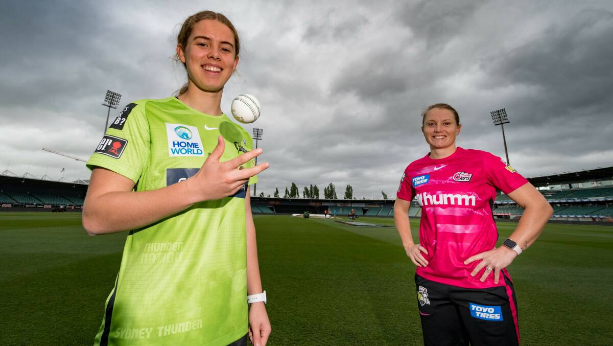 SMASH TIME: Phoebe Litchfield and Alyssa Healy ahead of the Thunder and Sixers Sydney smash at Launceston on Saturday. Photo: PHILLIP BIGGS
