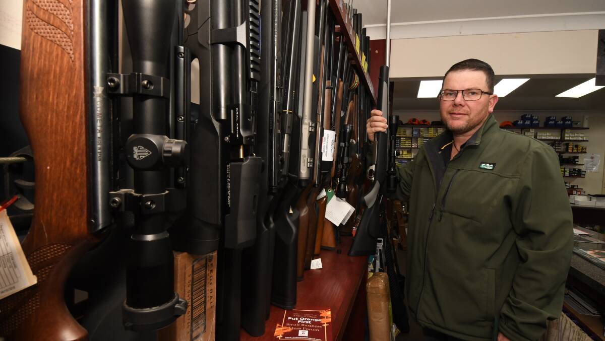 LESS BUT MORE: Bullets and Bits owner Ray Hawkins says it's not surprising there's more guns but fewer owners in the region. Photo: JUDE KEOGH