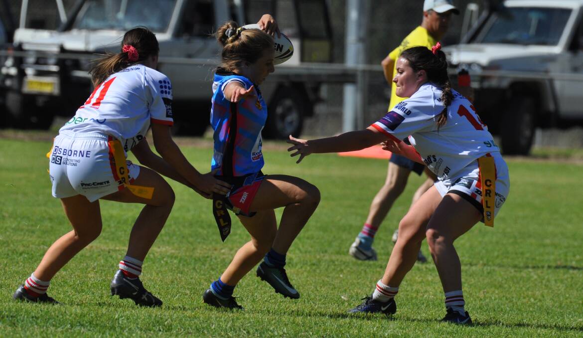 THROUGH A GAP: Cargo gun Sami Laing attempts to slice through, her Blue Heelers side takes on Grenfell on Sunday. 