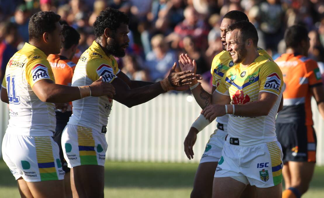 HIGH FIVE: Raiders star Josh Hodgson celebrates a four-pointer at Wade Park, the last time the NRL was played in Orange in 2016. Photo: PHIL BLATCH
