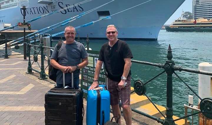 ALL ABOARD: David Cardwell and Frank Ostini prepare to board the Ovation of the Seas on December 4. Photo: FACEBOOK
