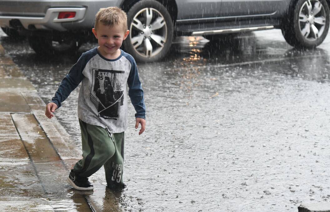 Thursday's storm drenched Orange. Photos: JUDE KEOGH