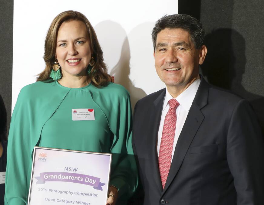 Rebecca Hilton-Brown with her award and NSW Acting Minister for Seniors Dr Geoff Lee