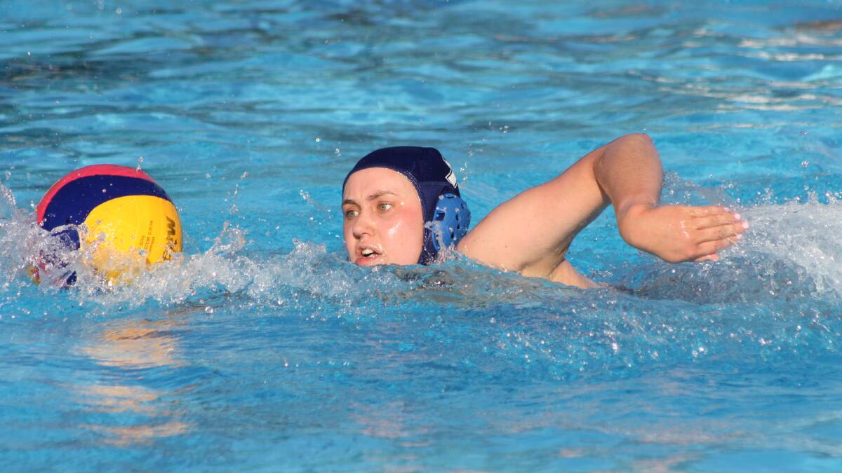 IN THE SWIM: Squids' Sophia Hoffenberg moves forward against KWS 3rds. Photo: MICHELLE COOK 1126mcwpolo2