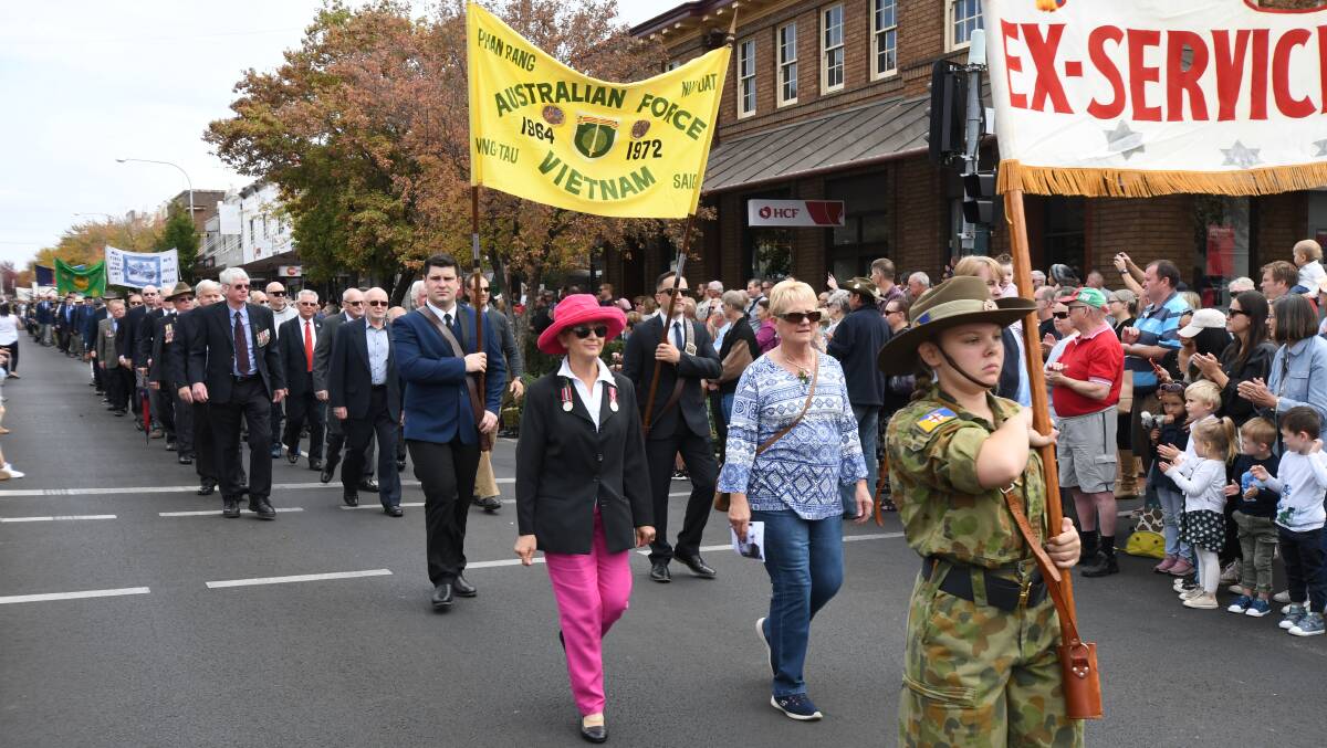 MARCH 2019: The Anzac Day march in 2019, down Summer Street towards the Robertson Park Cenotaph. Photo: CARLA FREEDMAN