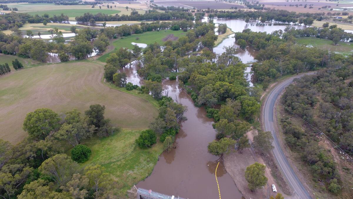 WATER ON THE WAY: Craig Dwyer captured this image of Jemalong Weir on Sunday with the Lachlan River at minor flood levels. The flood peak is expected to cause major flooding mid-week. Picture: Craig Dwyer