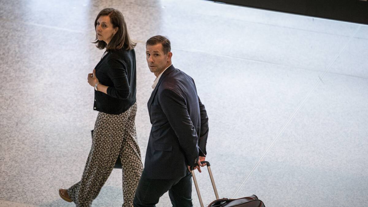 RANT: Mark Coyne was stood down as ARL commissioner. He's pictured arriving at Sydney airport with his wife Annie from Singapore. Photo: Edwina Pickles.