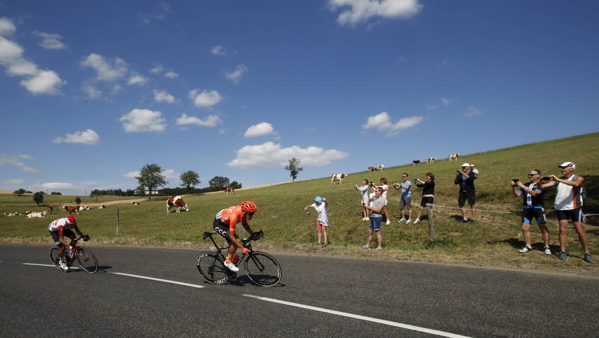 ON YOUR BIKE: Belgium's Thomas de Gendt, left, and Italy's Alessandro De Marchi, ride breakeway during the eighth stage of the Tour de France cycling race over 200 kilometers last Saturday. Photo: AAP
