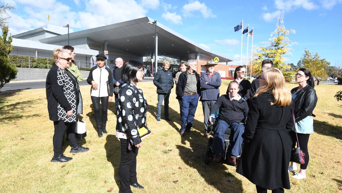 People gather outside of the Orange Hospital where doctors indicated a new sporting complex at the neighbouring Bloomfield site would pose a problem traffic wise for their service. Photo: JUDE KEOGH