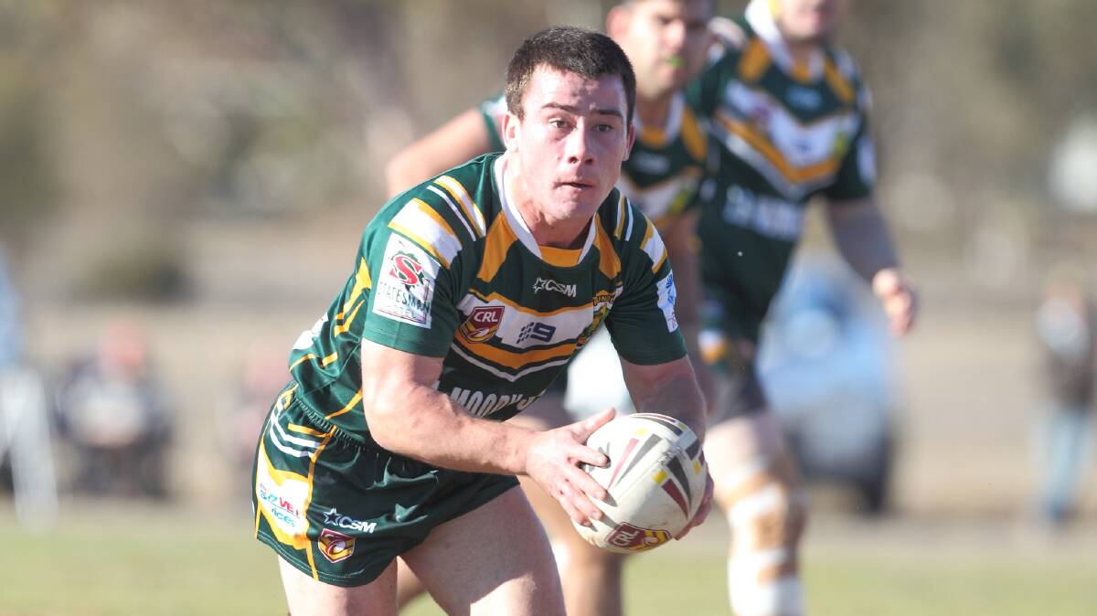 FOUR IN A ROW: Connor Farrer charges the ball forward for the Trundle Boomers. Photo: RS WILLIAMS