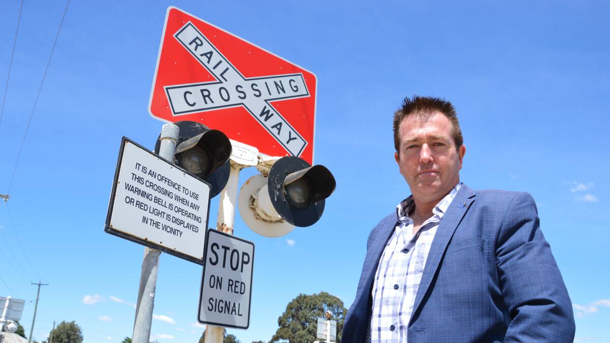 BE CAREFUL: Minister for Regional Transport and Roads Paul Toole is reminding motorists to be careful around level crossings in the region. 
