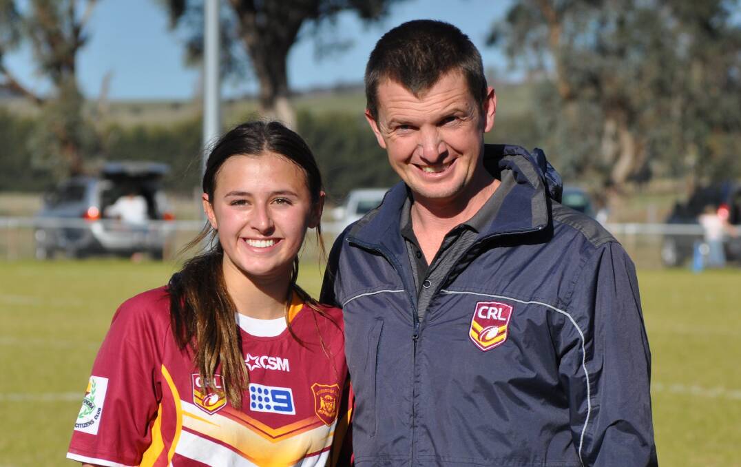 WORKING IT OUT: NSWRL Western Region manager Peter Clarke, pictured at the Woodbridge Cup versus mid-west rep games in 2019 with Molly Hoswell, says the region is working through its options to get on the field this season.