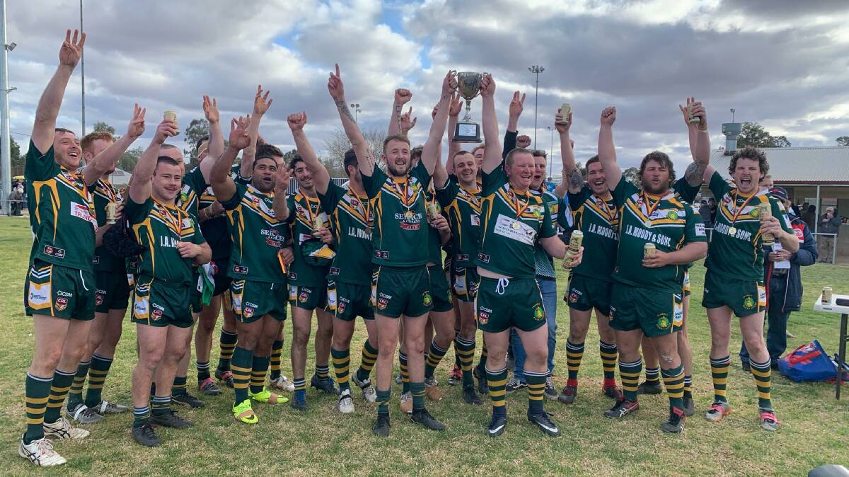 THREE IN A ROW: Trundle celebrated a third straight Woodbridge Cup grand final win on Sunday, hammering Manildra at Berryman Oval. Photo: TRUNDLE BOOMERS