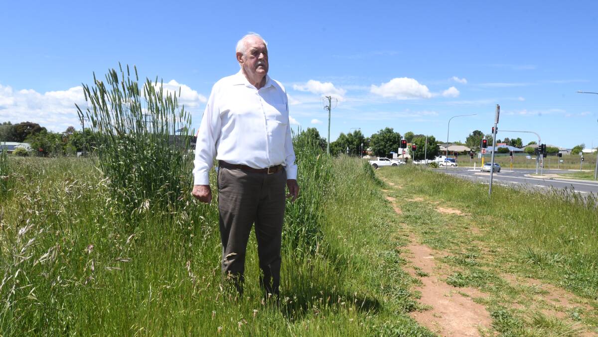 DANGEROUS EYESORE: Ron Judge believes Orange City Council should take action on the long grass on this vacant north Orange block. Photo JUDE KEOGH