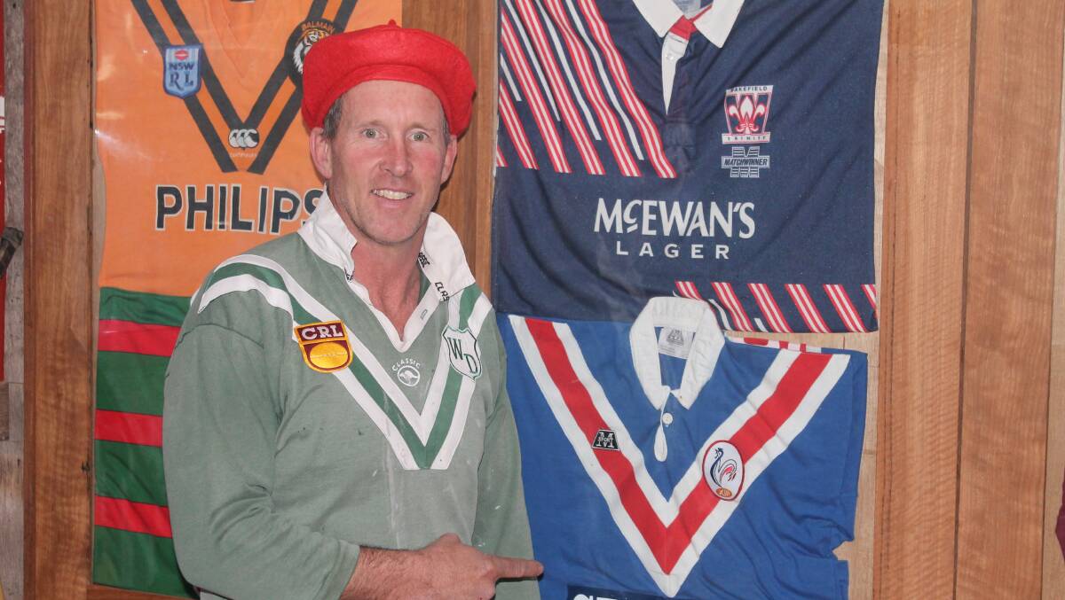 VIVA LE WESTERN: Jaime Kelso next to the French jersey he swapped after playing with Western as a 17-year-old in 1990. Photo: PETER CLARKE