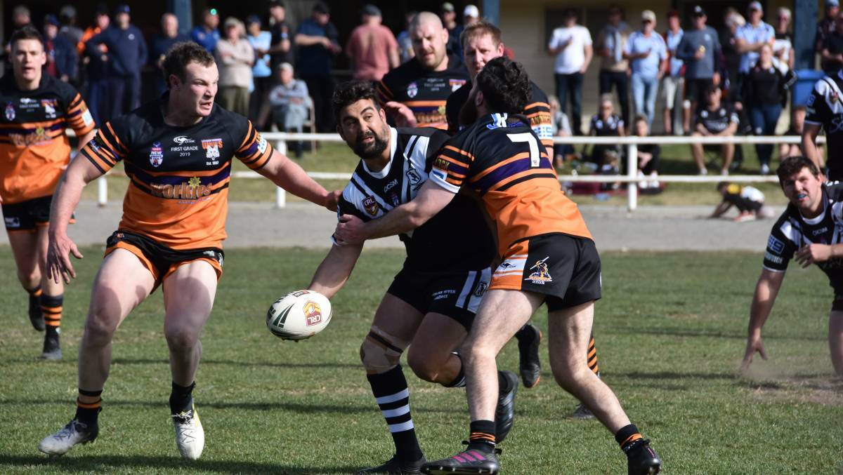 SENT PACKING: Cowra's Claude Gordon looks for an offload in the Magpies' loss to Lithgow. Photo: CIARA BASTOW