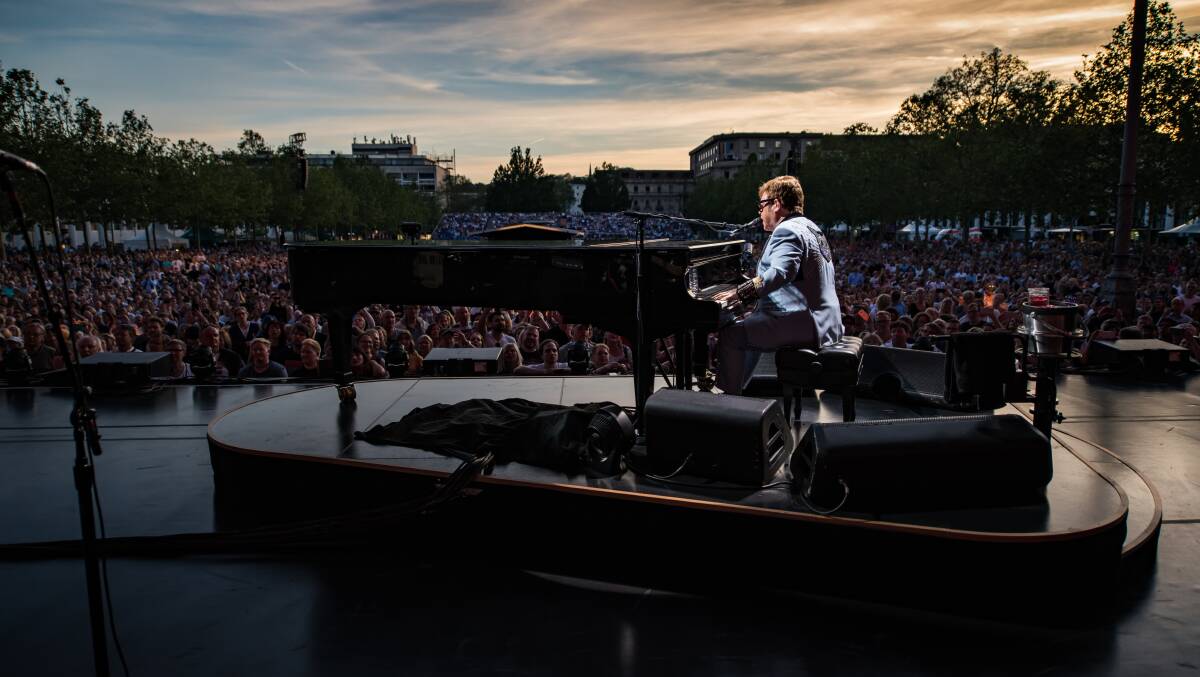 ON TOUR: Sir Elton John - who will bring his Farewell Yellow Brick Road show to Bathurst in January - performs in Germany. Photo: SUPPLIED
