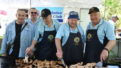 AUSTRALIA DAY: Orange Canobolas Lions Club members Robert Etienne, Brett Campbell, Bob Fabry, Bill McAuliffe, Phil Baker at the barbecue at Cook Park in 2019. Photo: JUDE KEOGH