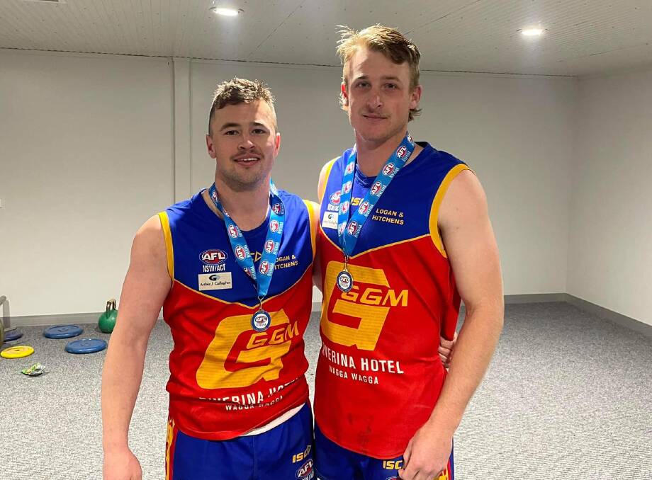 Michael Rothnie and and fellow Central West product Mitch Taylor with their Riverina League premiership medals. Picture supplied.