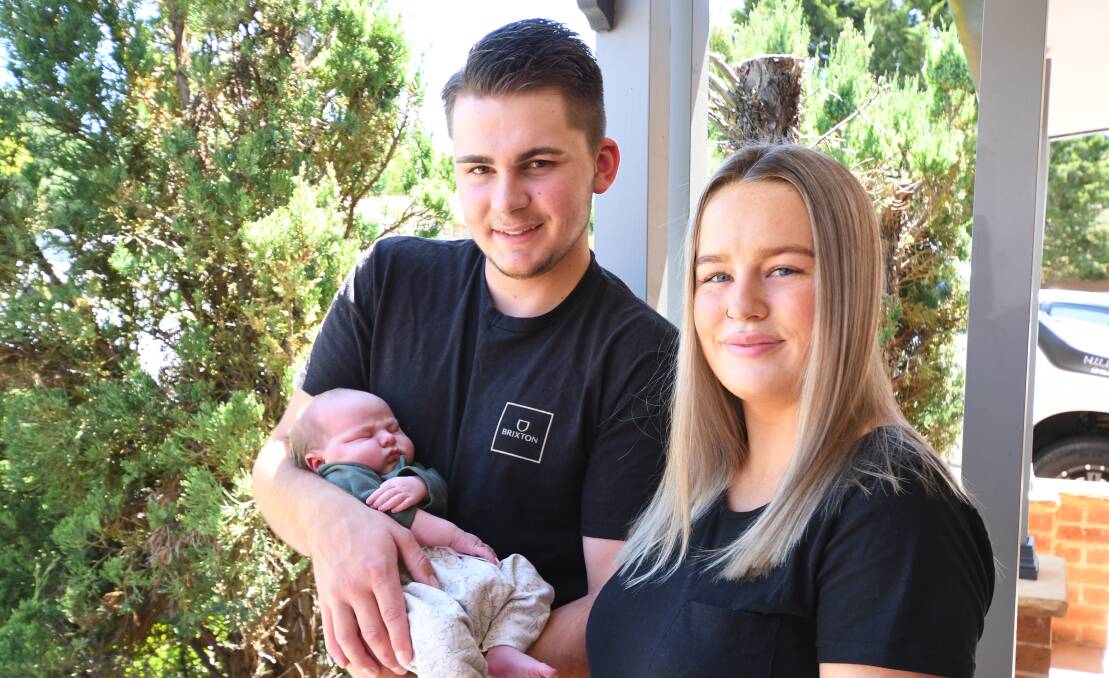 Jessica Toohey and Charlie Spackman with newborn son Harley Kevin Spackman, the first baby born in Orange in 2022. Photo: JUDE KEOGH