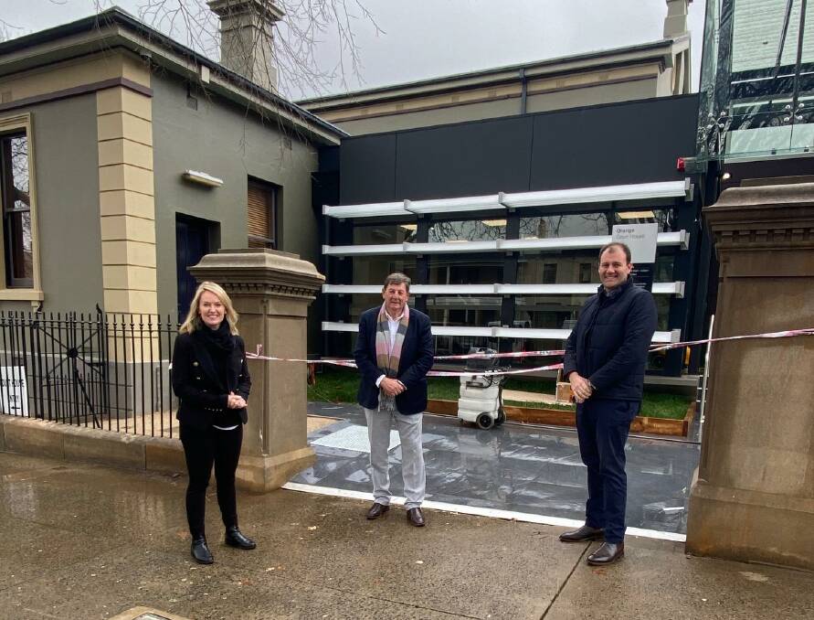 NEW AND IMPROVED: Reg Kidd (centre) with MLCs Sam Farraway (right) and Natalie Ward (left) inspecting work on Courthouse. Photo: CONTRIBUTED 
