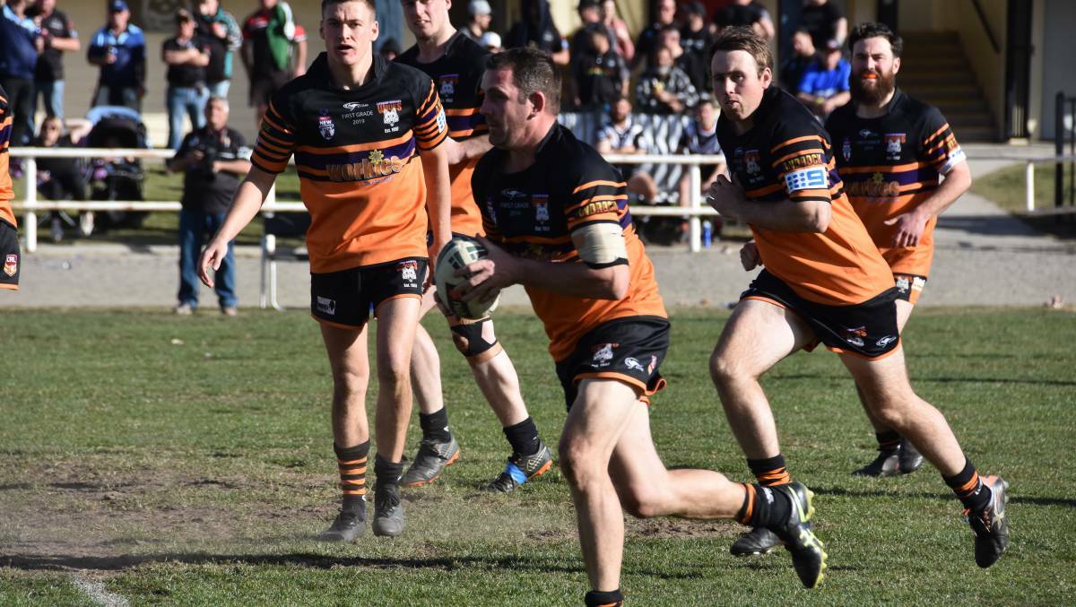 HERE WE COME: Lithgow's Jono Van Veen takes the ball up for Workies. Photo: CIARA BASTOW
