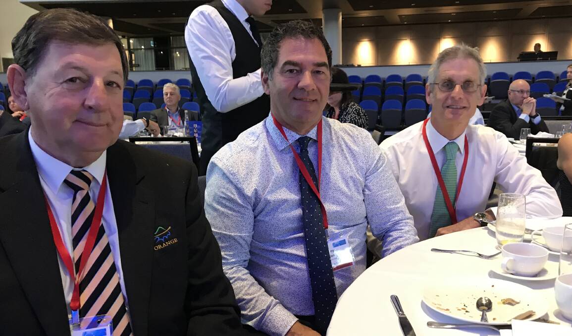 CONFERENCE: Orange mayor Reg Kidd alongside councillors Tony Mileto and Stephen Nugent at the NSW Local Government conference.