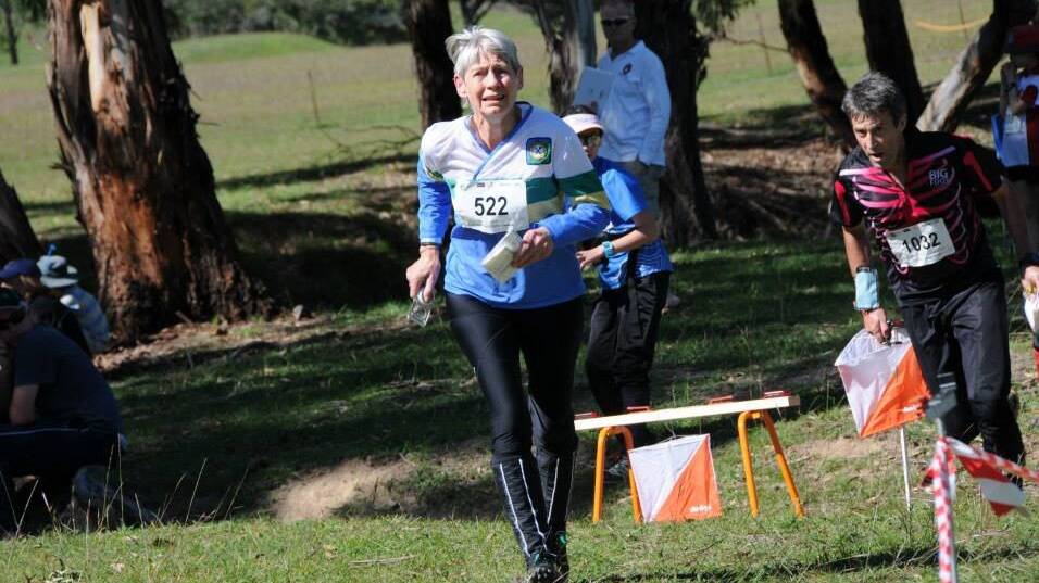 ON THE RUN: Jean Baldwin competing in an Easter orienteering competition in 2014. The annual Australian four-day carnival will be in Orange in 2021. 