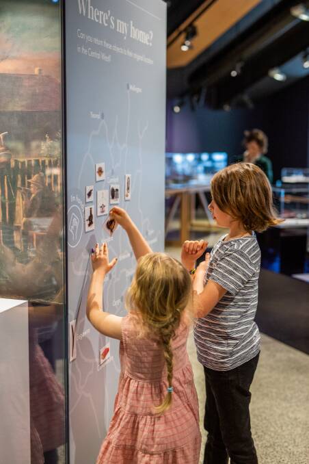 FUN TO BE HAD: Frank Salmon-Meek and Maggie Salmon-Meek enjoy what's on offer at the museum ahead of the school holidays. Photo: Rosie Long Photography