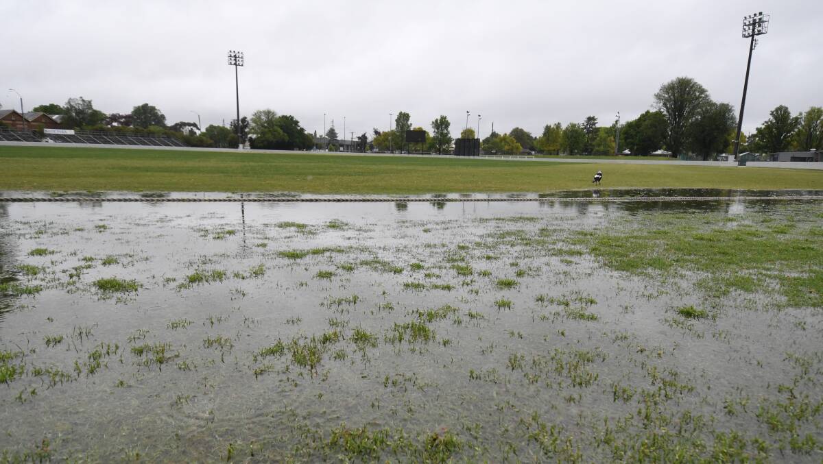 WASH OUT: The second round of the BOIDC has been washed out, with games at Wade Park and other venues across either city not fit for play. Photo: JUDE KEOGH