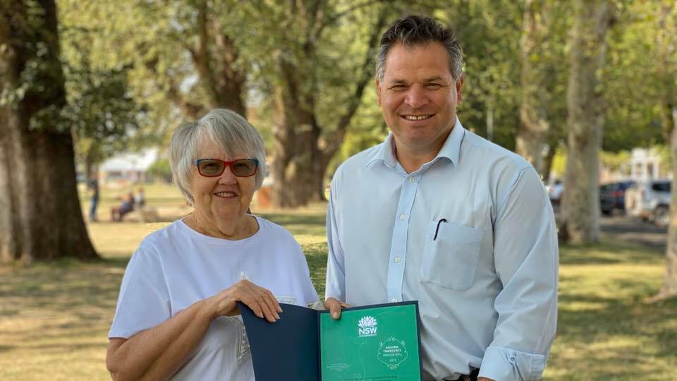 HONOUR: Phil Donato presents Helen Karrasch of Orange her certificate of inclusion into the 2019 Hidden Treasures Honour Roll. Photo: CONTRIBUTED
