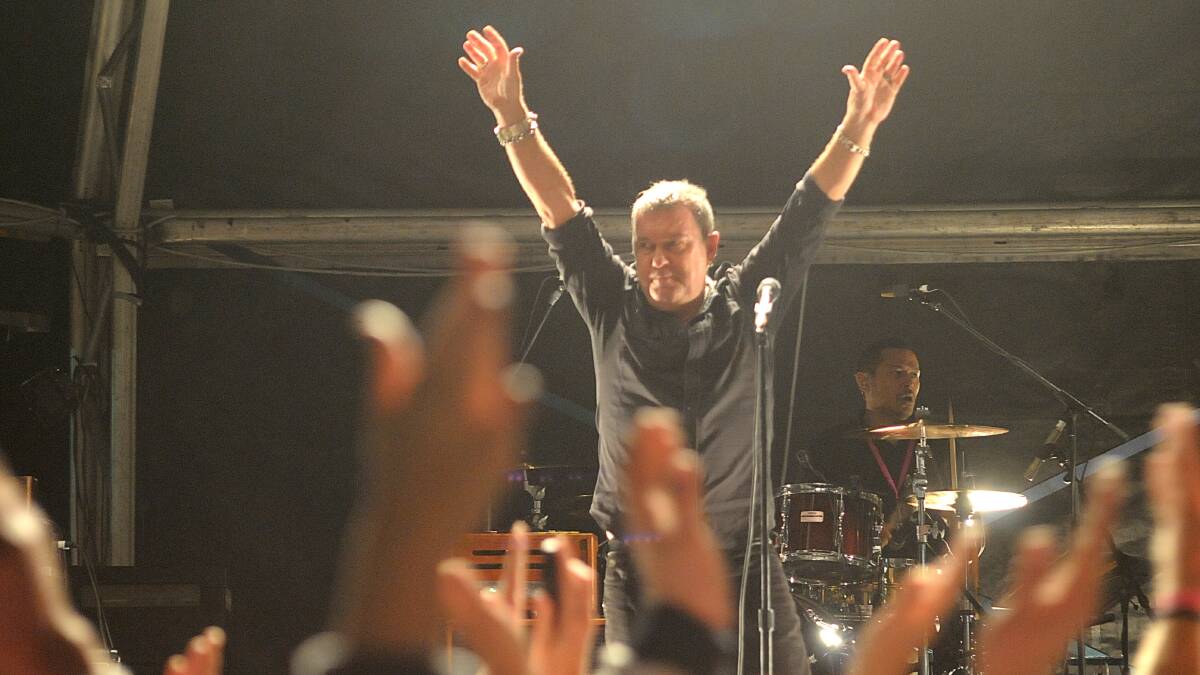 HANDS UP: Jimmy Barnes at his last performance in Orange in 2010. Photo: JUDE KEOGH
