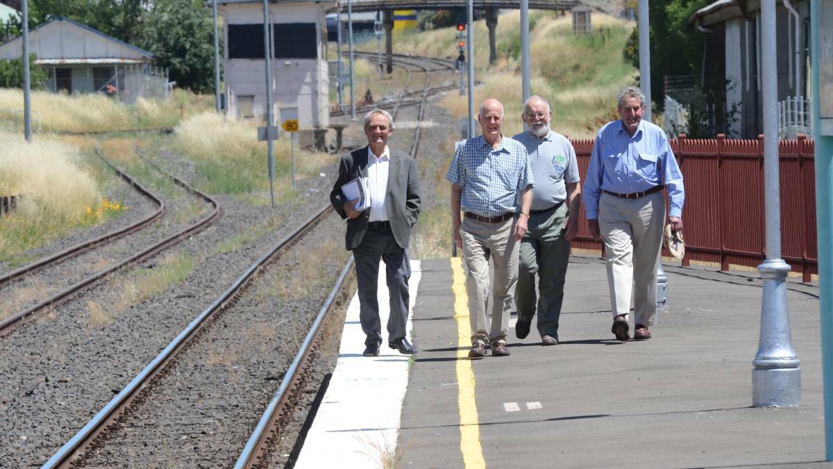 Orange Rail Action Group's Dr Peter Bilenkji, then-councillor Neil Jones, Phil Stevenson and David Williams in 2015. Picture by Mark Logan