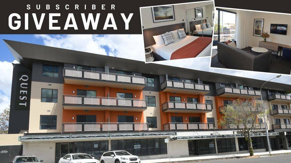 WINNERS: Jeremy Curtin and Ray Vardanega have each won a night's stay at the new Quest Apartments in Orange. 