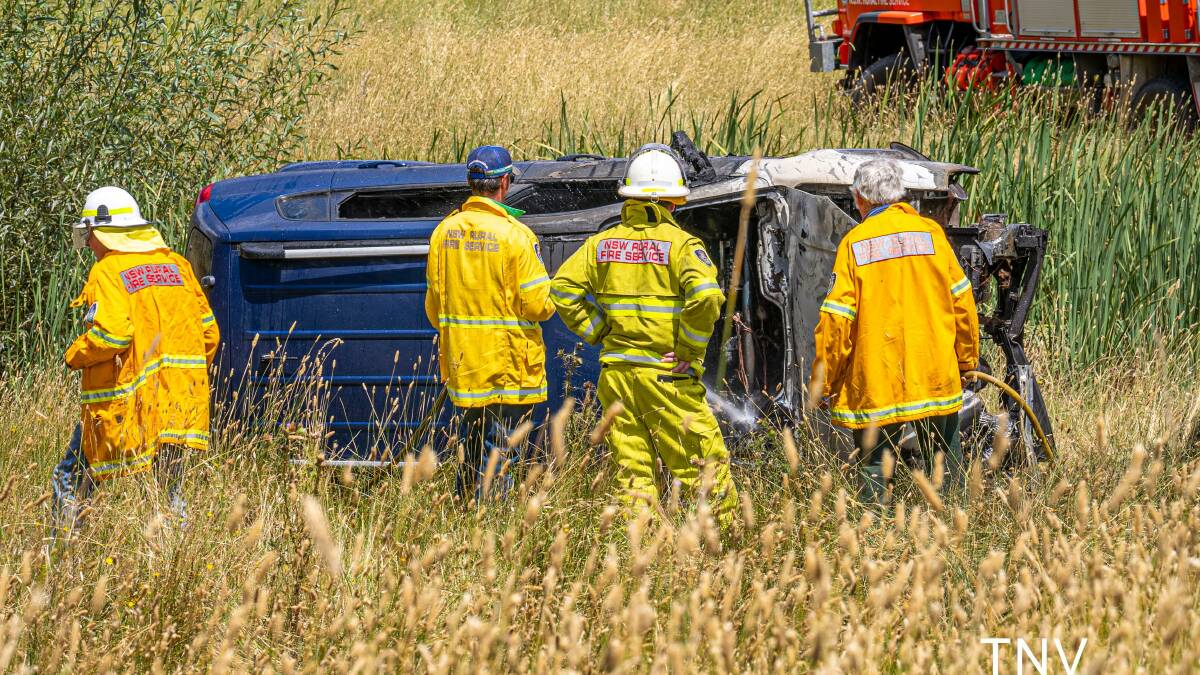 NSW RFS crews on the scene of the accident. Photo: TROY PEARSON/TNV