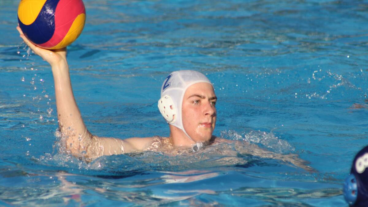 OPTIONS: KWS 3rds' Joseph Armstrong looks at his options against Squids. Photo: MICHELLE COOK 1126mcwpolo3